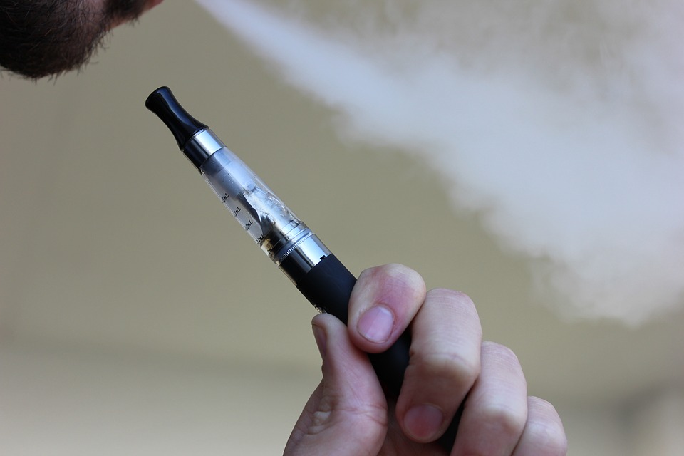 person using a vaping device