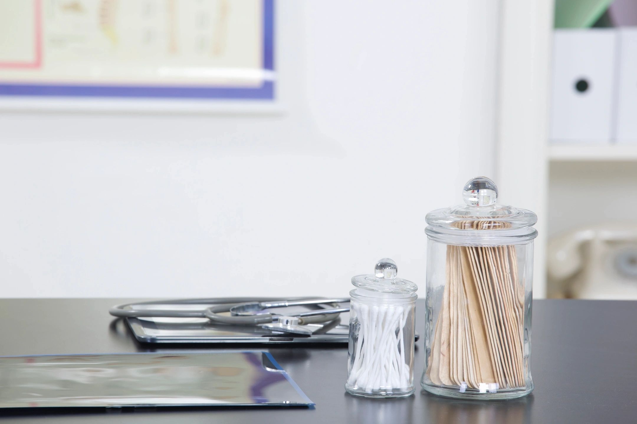 Desk with tongue depressor and swabs