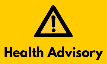 Black triangle with an exclamation mark in the middle and "Health Advisory" written below. Appearing on yellow background.